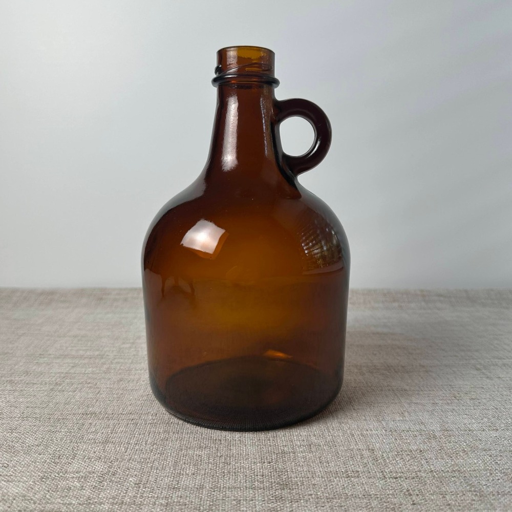 Vintage Lucky Leaf Amber Glass Cider Jug Bottle 46 Oz 50-A-55 Loop Handle
